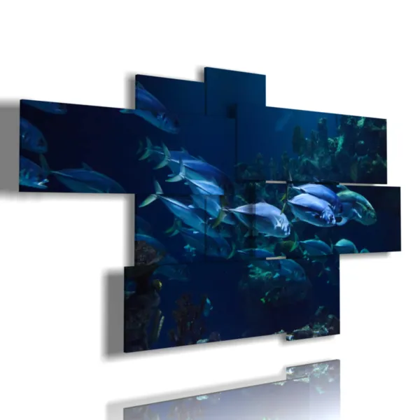 Cuadros modernos con peces en el profundo azul.