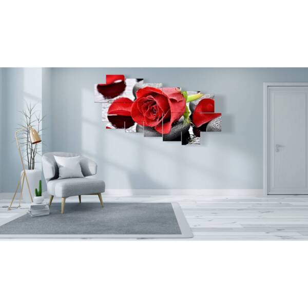 quadri moderni rose rosse nei sassi neri