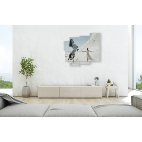 a painting of horses running