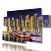 Print with an image of Dubai at night.