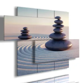 cuadro de arena en movimiento con piedras zen