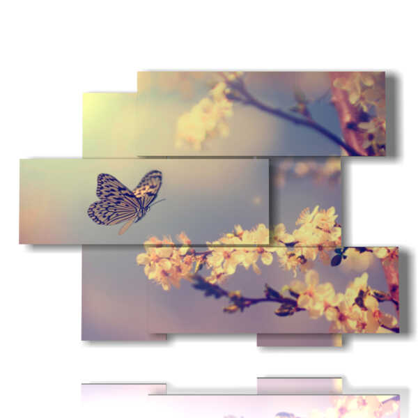 farfalle quadro su fiori di ciliegio