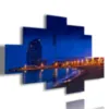 a picture with a photo of Barcelona at night