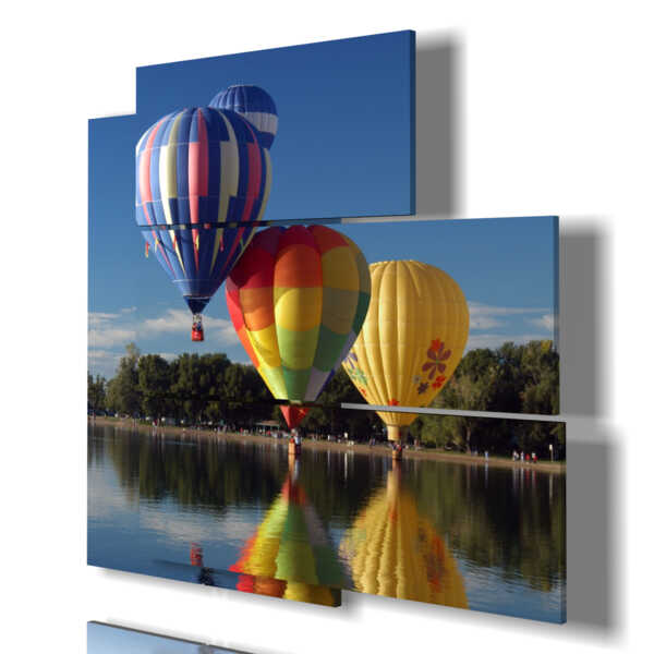 paintings of hot air balloons suspended in the lake