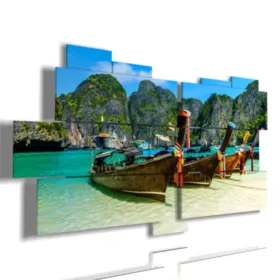 paintings of boats on the seashore